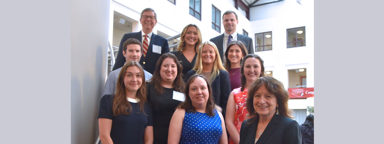 A group of graduates pose for a photo A group of graduates pose for a photo