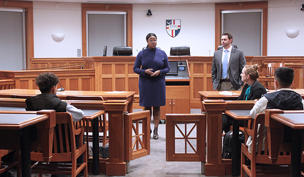 law student talking in the courtroom