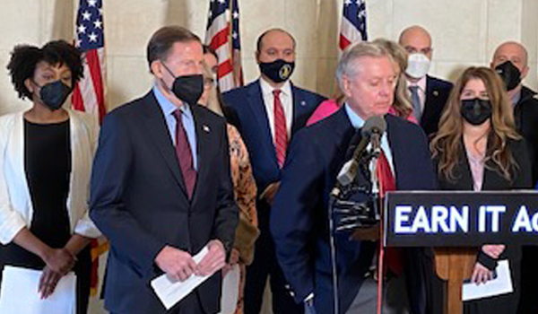Senators standing at a podium - Earn It Act