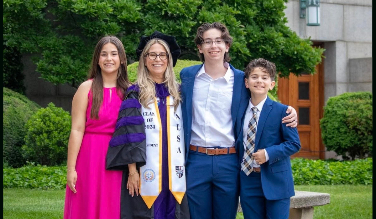 Julie Orland with her children after Commencement