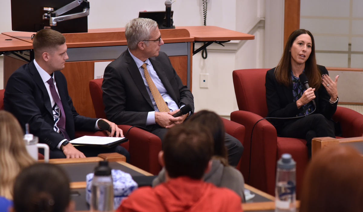 Robbie Dickson ‘24, Reynold Hoover '97 and Janet Evans