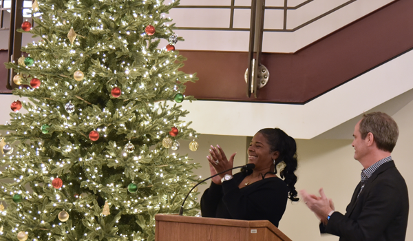 Officer DeVaughn Fowler lights the Christmas tree