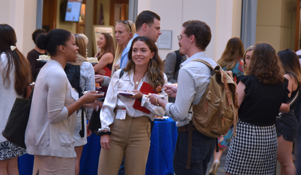 Students at induction ceremony reception