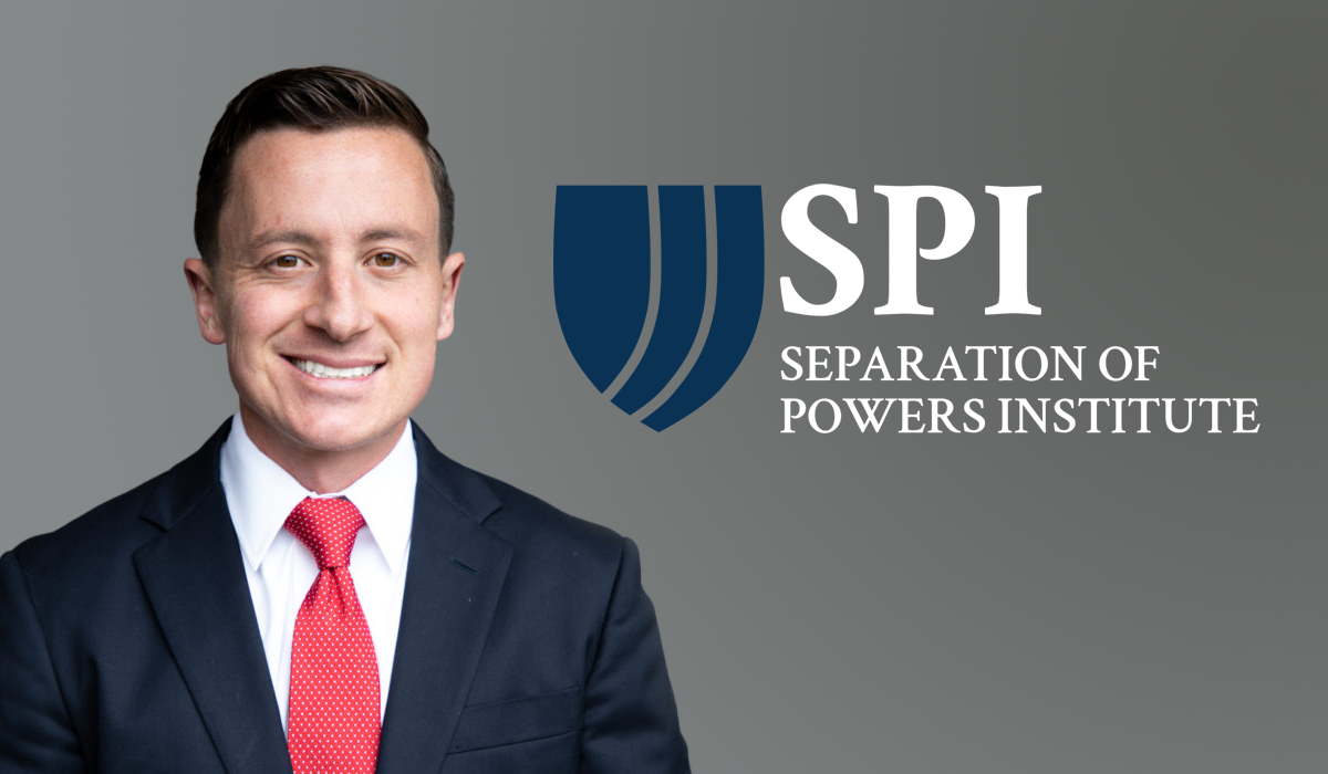 Professor Chad Squitieri with SPI logo