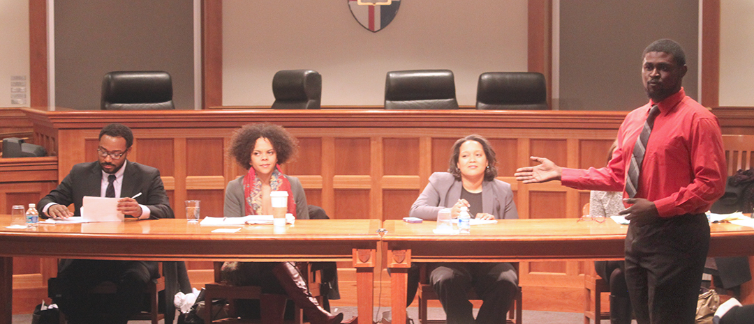 Banks introduces the panel taking part in the "Focus on Ferguson: Police Use of Force and Next Steps" discussion